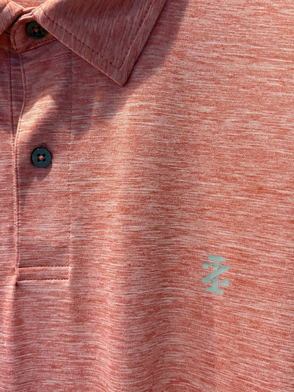 Izod Men's Heathered Coral Polo - Picture 2 of 6